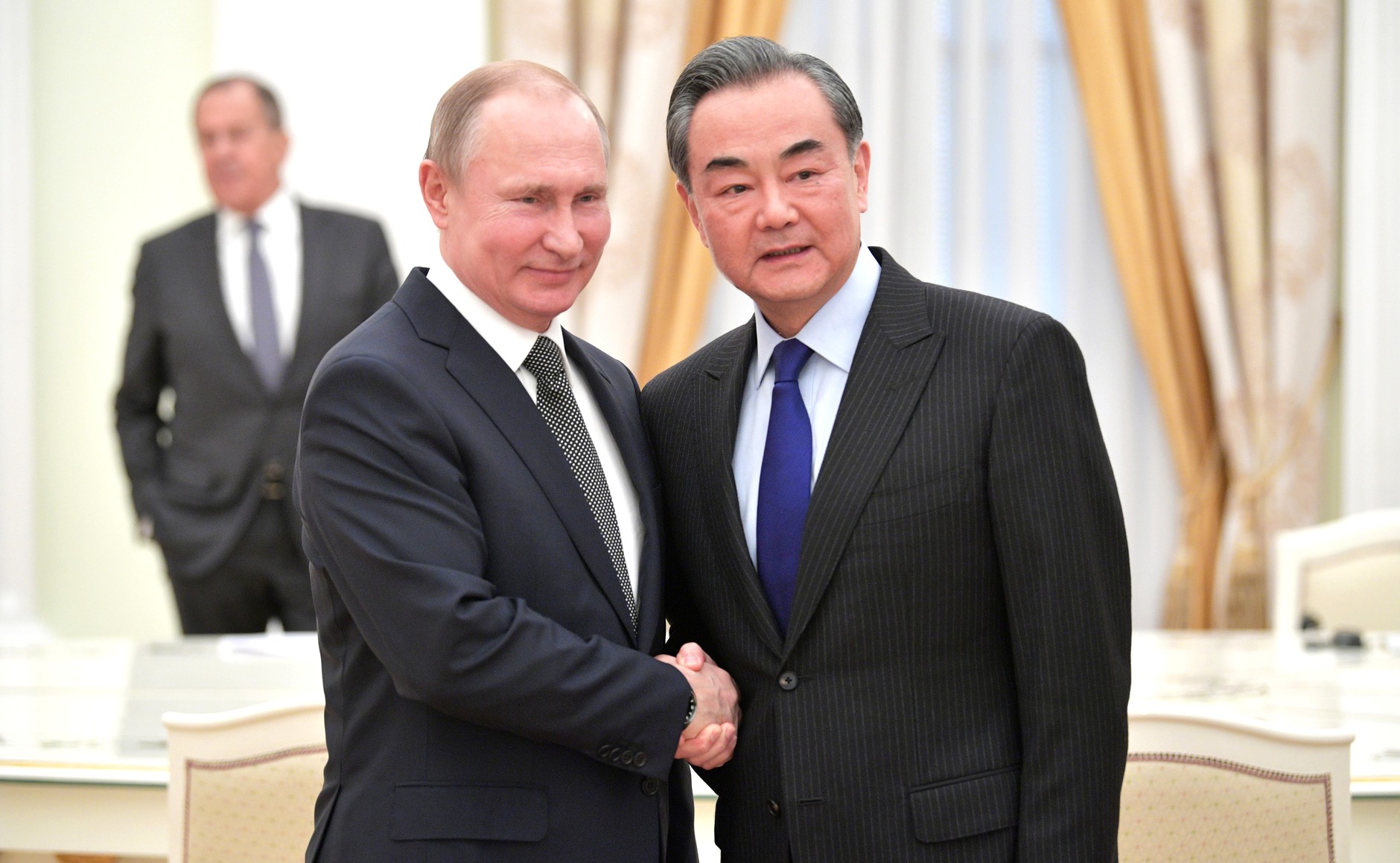 Vladimir Putin and Wang Yi