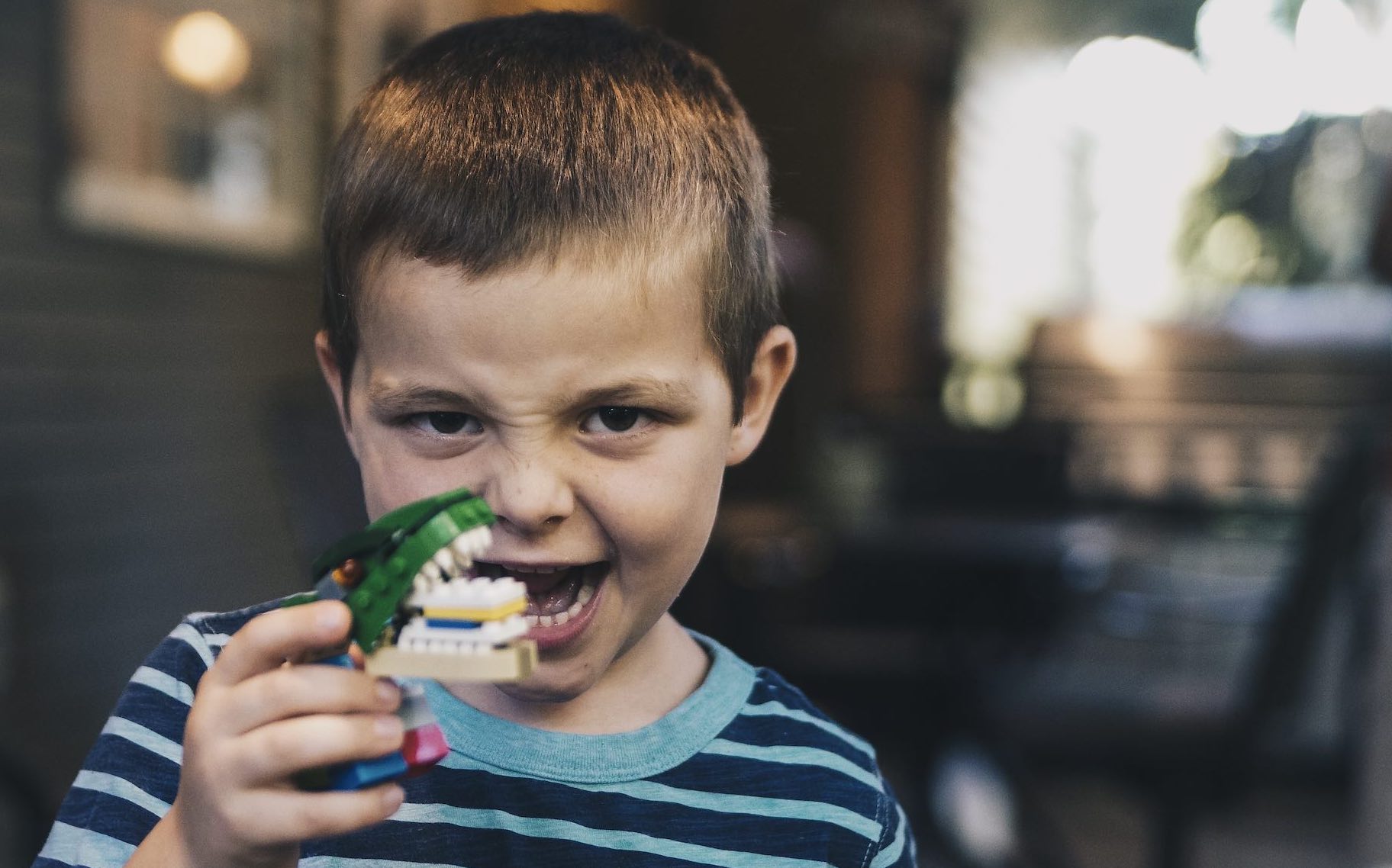 Main article Image: Boy with toy