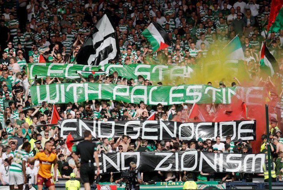 Celtic fans hold banners that say "End Genocide, End Zionism."