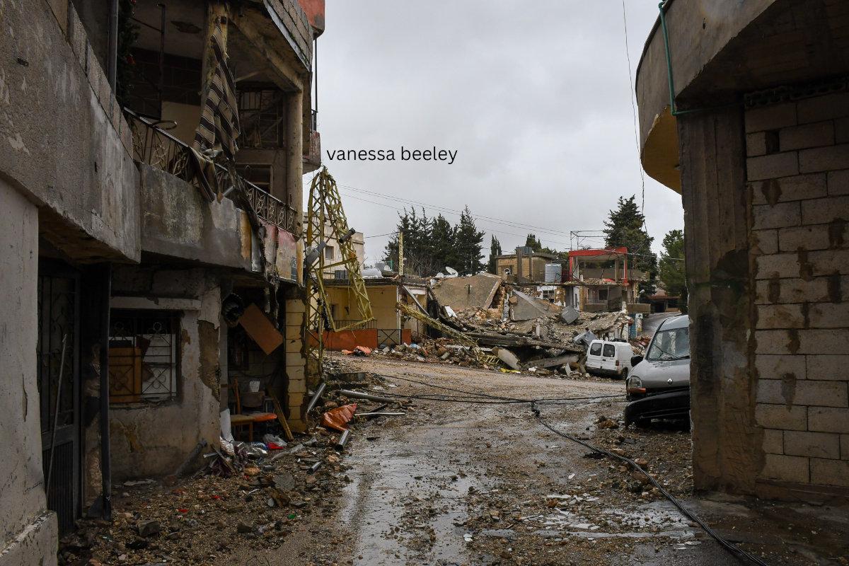 View of the destroyed building from the neighbouring narrow streets, showing that a strike in the centre of the town will affect all the surrounding residences. Photo: Vanessa Beeley