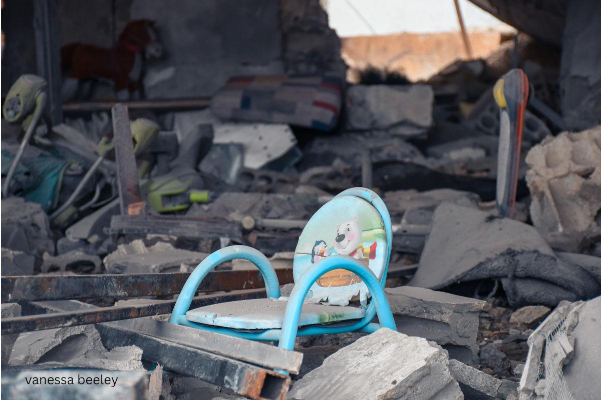 child's chair in the rubble