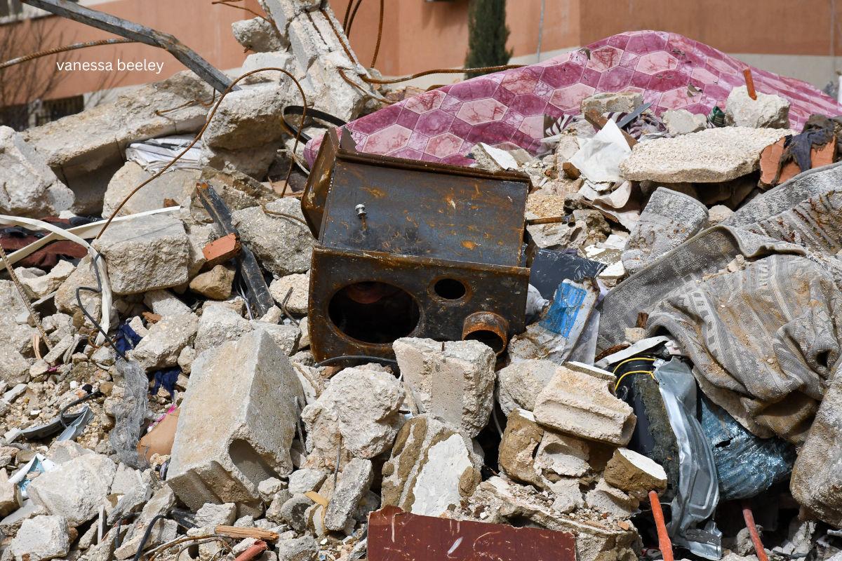 destroyed stove in the rubble