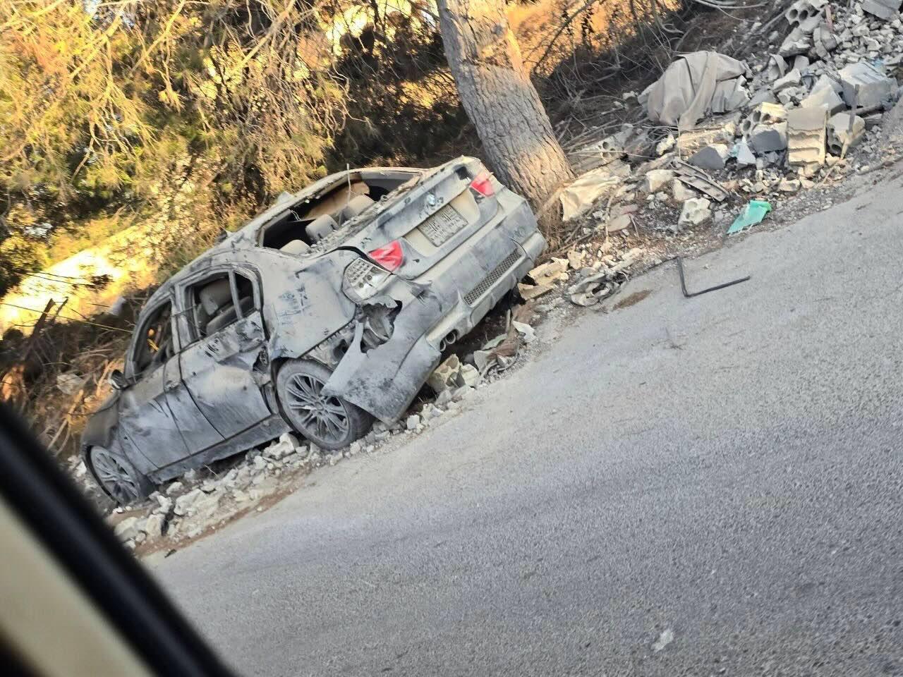 A burned-out vehicle destroyed in an Israeli drone strike on the outskirts of Shoukine, southern Lebanon. Photo: Roqayah Chamseddine
