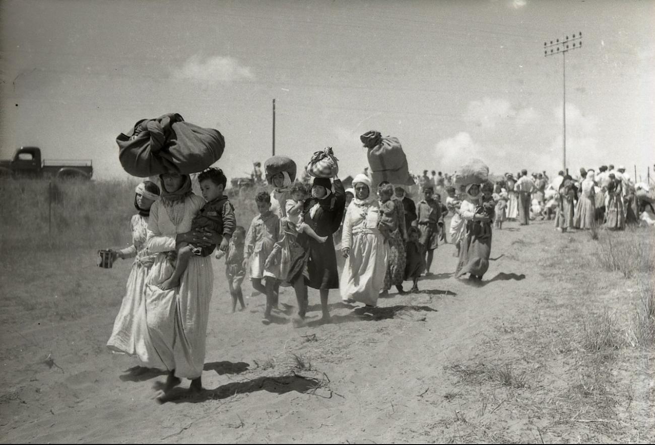 Palestinian women and children being forcibly expelled from the Palestinian village of Tantura in 1948