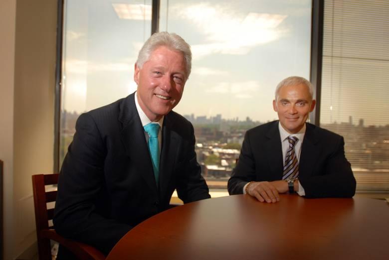 Bill Clinton with Frank Giustra. How Bill and Hillary raised and earned millions from Canada's corporate elite.