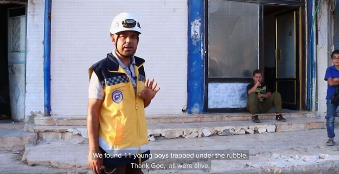 Screenshot from one of Hala Systems promotional videos. A White Helmet operative describing 11 young boys trapped under the rubble in Idlib.